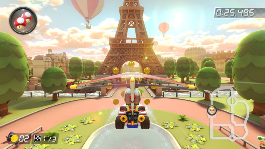 Mii no ar enquanto pilota um kart; ao fundo, a Torre Eiffel.